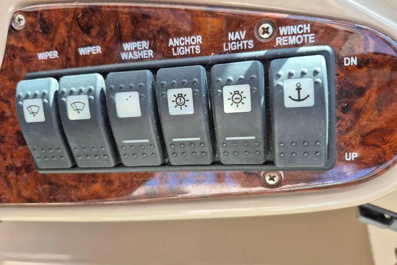  Yacht Photos Pics Control panel of a 2004 Riviera 4000 Offshore boat with various switches.