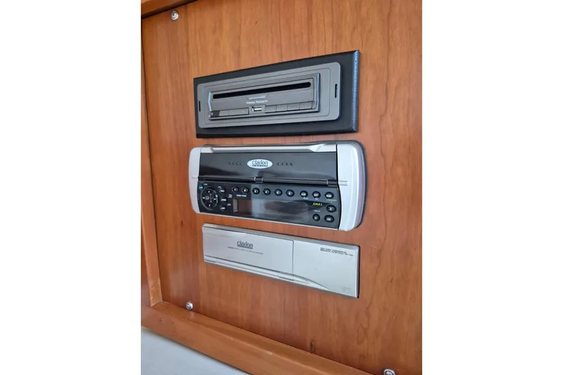  Yacht Photos Pics 2004 Riviera 4000 Offshore audio system with Clarion stereo and cassette player.