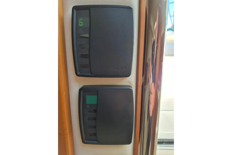  Yacht Photos Pics Control panel on a 2004 Riviera 4000 Offshore yacht, featuring digital displays.