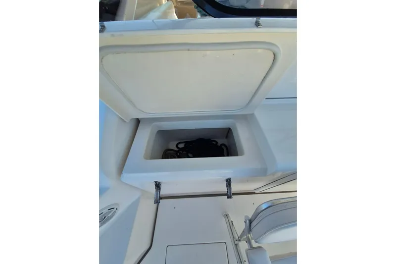  Yacht Photos Pics Open storage compartment on a 2004 Riviera 4000 Offshore boat.