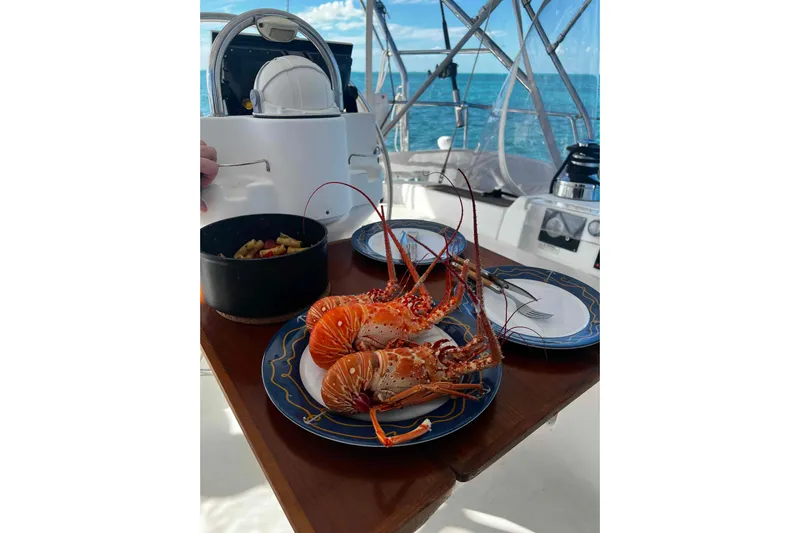 Monlove Yacht Photos Pics Grilled lobsters on a Beneteau 393 yacht, 2007 model, with ocean view.