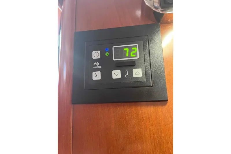 Monlove Yacht Photos Pics Dometic control panel on 2007 Beneteau 393 yacht, displaying temperature setting at 72 degrees.