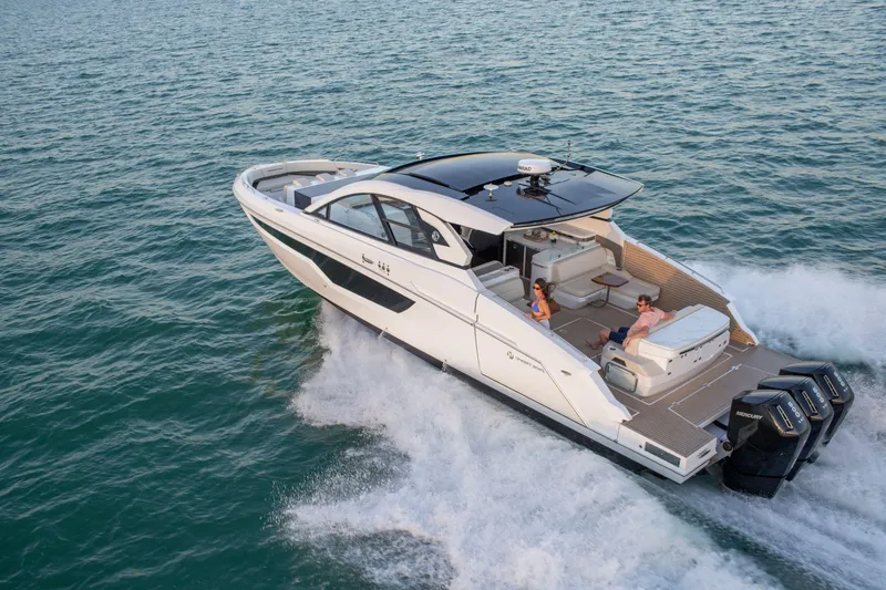  Yacht Photos Pics 2026 Cruisers Yachts 50 GLS cruising on open water, showcasing luxury and performance.