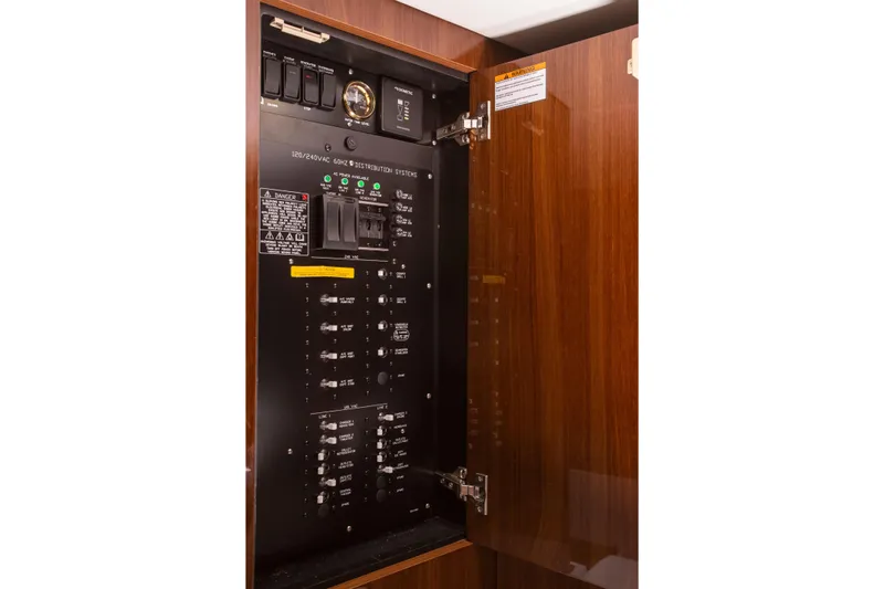  Yacht Photos Pics Electrical panel inside 2026 Cruisers Yachts 50 GLS, featuring distribution systems.