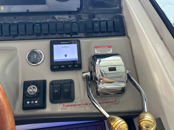  Yacht Photos Pics Control panel of a 2005 Sea Ray 420 Sundancer with throttle and GPS display.