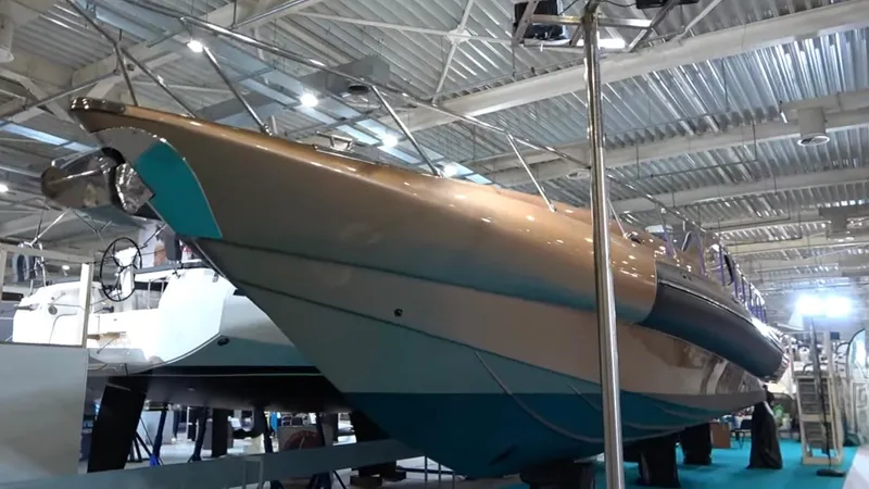 1676 Yacht Photos Pics Custom RIB 60 boat 2023 displayed in an exhibition hall.