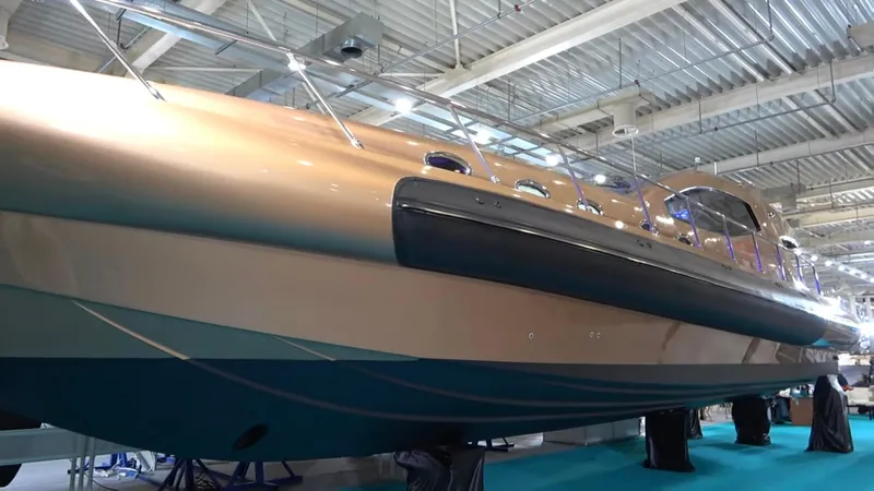 1676 Yacht Photos Pics Custom RIB 60 boat 2023 in an exhibition hall.