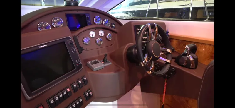 1676 Yacht Photos Pics Cockpit of Custom RIB 60, 2023, featuring modern instruments.