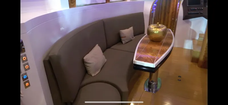 1676 Yacht Photos Pics Interior of Custom RIB 60, 2023, featuring elegant seating and table.