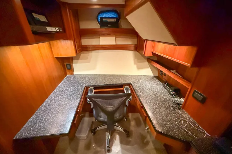 Ring Leader Yacht Photos Pics Luxurious 2007 Nordic Tug 54 yacht office with wooden cabinetry and ergonomic chair.