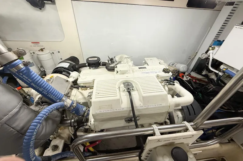 Ring Leader Yacht Photos Pics Engine room of a 2007 Nordic Tug 54, showcasing detailed machinery and components.