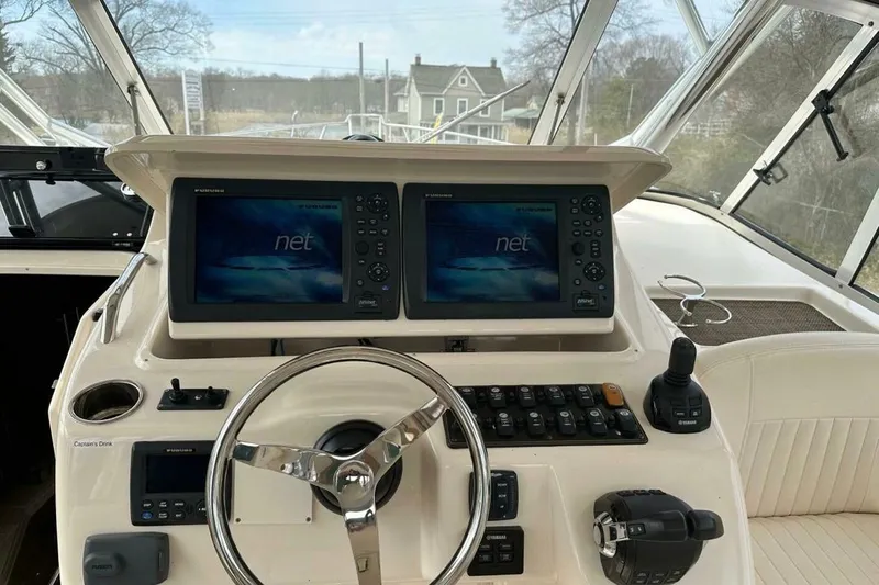  Yacht Photos Pics Helm of 2014 Grady-White Express 330 with dual navigation screens and controls.