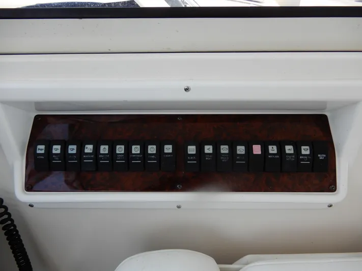  Yacht Photos Pics Control panel of 2006 Regal Commodore 3760 IO boat with labeled switches.