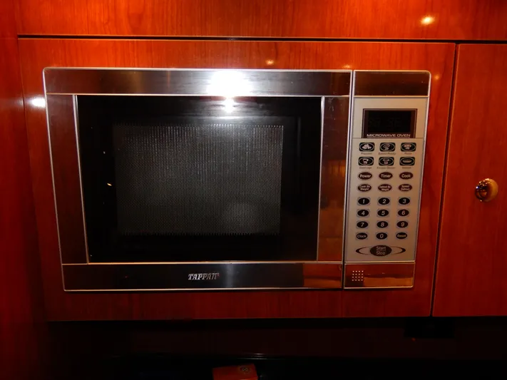  Yacht Photos Pics Built-in Tappan microwave oven in 2006 Regal Commodore 3760 IO yacht kitchen.