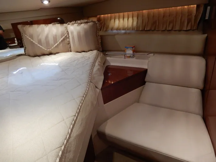  Yacht Photos Pics Luxurious interior of 2006 Regal Commodore 3760 IO yacht with bed and seating area.
