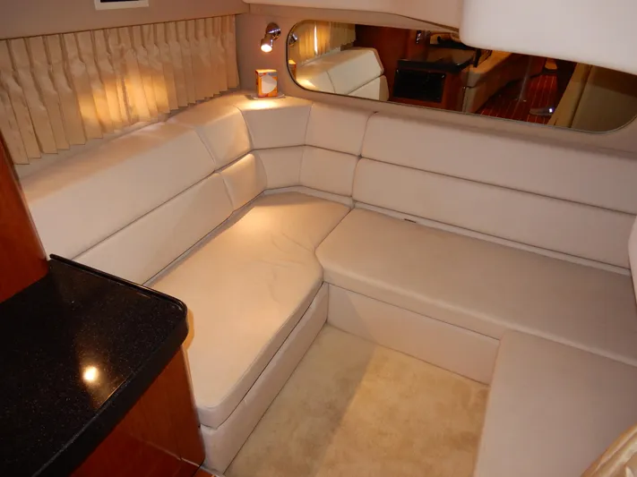 Yacht Photos Pics Interior of 2006 Regal Commodore 3760 IO yacht with beige seating and elegant lighting.