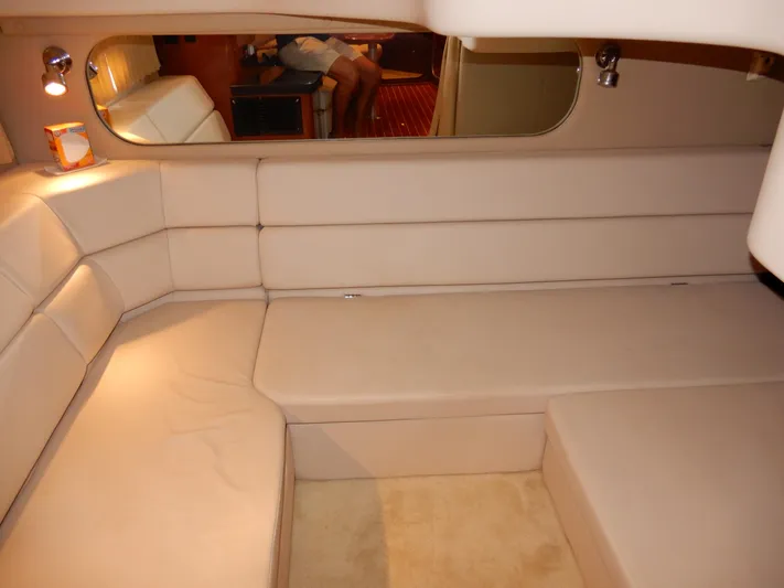  Yacht Photos Pics Interior of 2006 Regal Commodore 3760 IO with beige seating and ambient lighting.