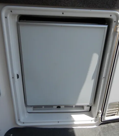  Yacht Photos Pics Built-in refrigerator on 2006 Regal Commodore 3760 IO boat.