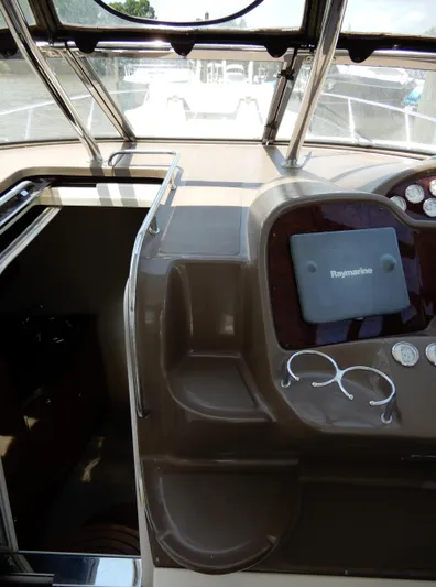  Yacht Photos Pics 2006 Regal Commodore 3760 IO boat cockpit with Raymarine navigation system.