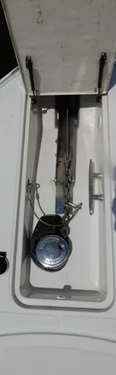  Yacht Photos Pics Anchor compartment of 2006 Regal Commodore 3760 IO boat, featuring chain and cleat.