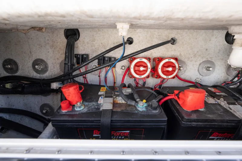  Yacht Photos Pics Battery compartment of 2024 Bluewater 2550 boat with wiring and switches.