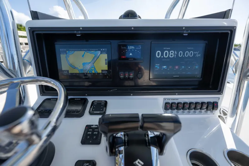  Yacht Photos Pics 2024 Bluewater 2550 boat dashboard with advanced navigation and control systems.