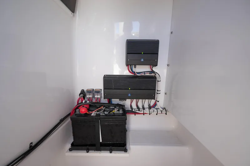  Yacht Photos Pics 2024 Bluewater 2550 boat electrical system with batteries and wiring setup.