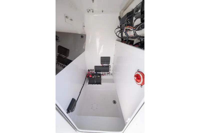  Yacht Photos Pics 2024 Bluewater 2550 boat interior with electrical components and wiring.