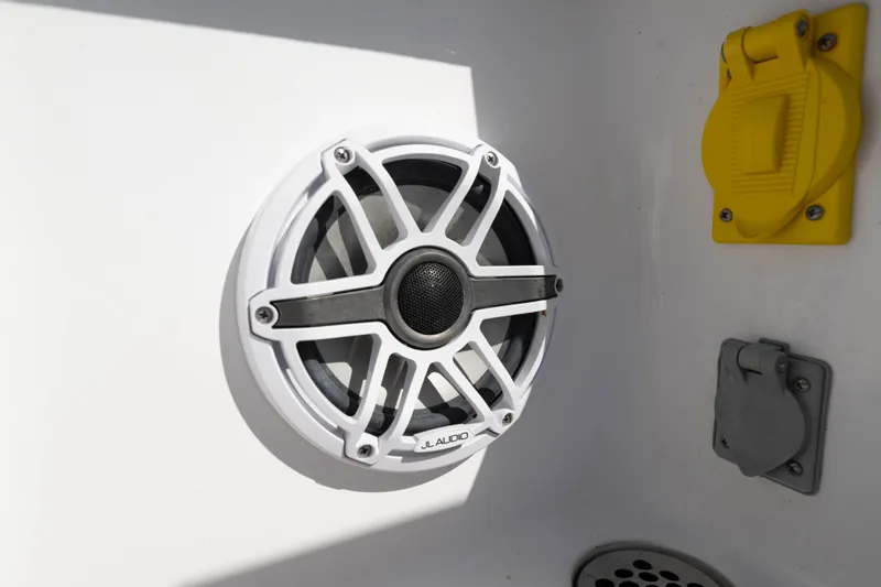  Yacht Photos Pics 2024 Bluewater 2550 boat featuring JL Audio speaker and electrical outlets.