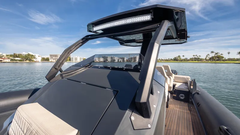 2024 Skipper 38 Powered By Twin 500r Yacht Photos Pics 2024 Skipper-BSK 38 boat on water, featuring sleek design and modern architecture.