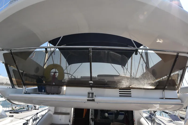 Spirit Bear Yacht Photos Pics 2006 Princess 50 yacht rear view with glass railing and canopy.