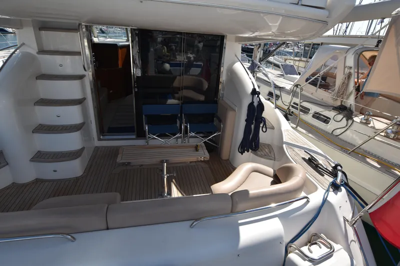 Spirit Bear Yacht Photos Pics Luxurious 2006 Princess 50 yacht deck with seating and elegant design.