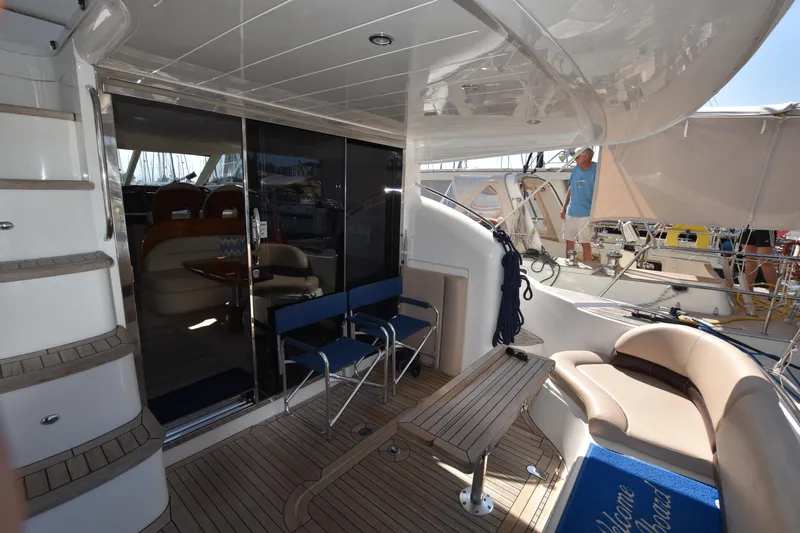 Spirit Bear Yacht Photos Pics Luxurious 2006 Princess 50 yacht deck with seating and elegant interior view.