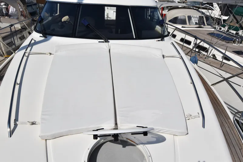 Spirit Bear Yacht Photos Pics 2006 Princess 50 yacht deck with sunpad and sleek design.