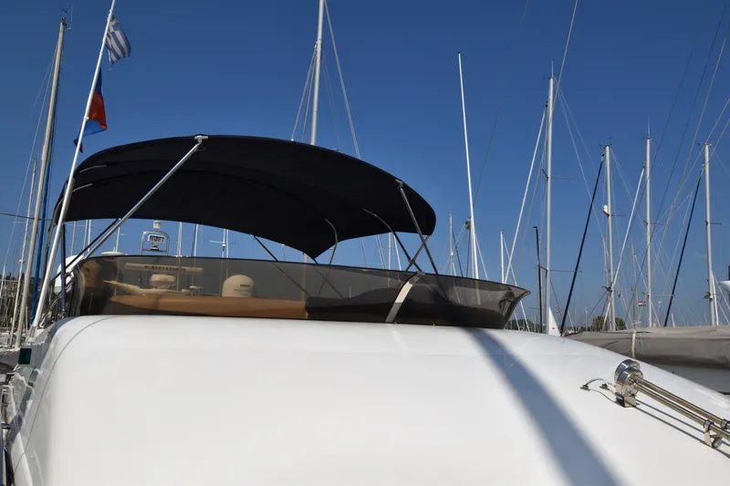 Spirit Bear Yacht Photos Pics Luxury Princess 50 yacht from 2006 docked in marina under clear blue sky.