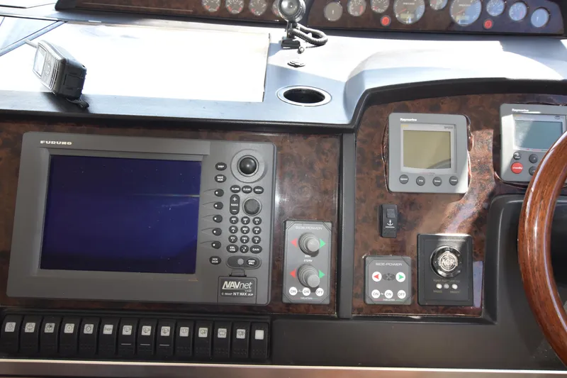 Spirit Bear Yacht Photos Pics Control panel of a 2006 Princess 50 yacht with navigation and communication equipment.