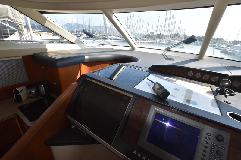 Spirit Bear Yacht Photos Pics Interior view of 2006 Princess 50 yacht cockpit with navigation equipment.