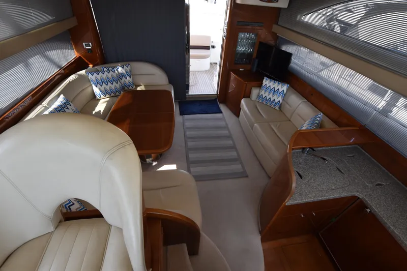 Spirit Bear Yacht Photos Pics Luxurious interior of 2006 Princess 50 yacht with elegant seating and modern decor.
