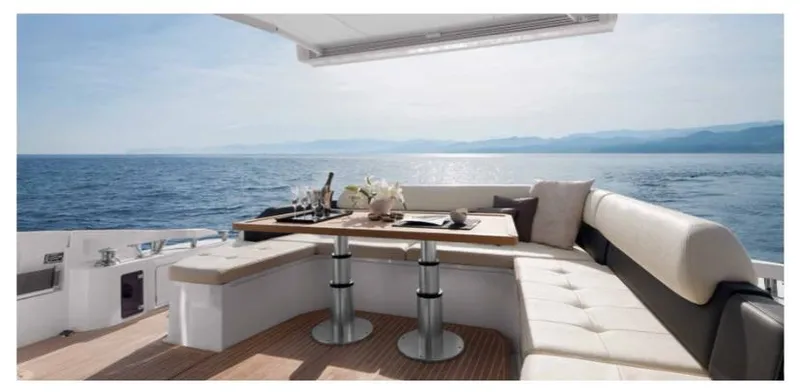  Yacht Photos Pics Luxurious seating area on a 2012 Azimut 55S yacht with ocean view.