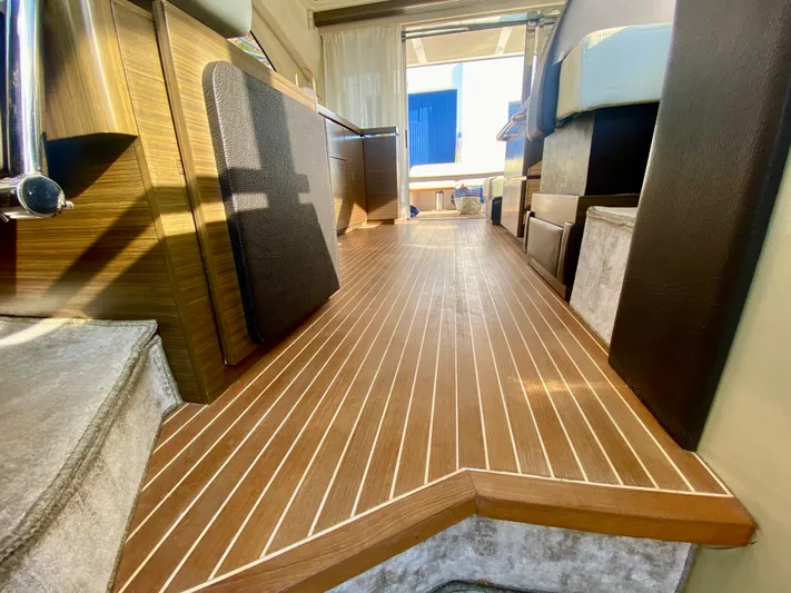  Yacht Photos Pics Luxurious interior of 2012 Azimut 55S yacht with elegant wooden flooring.