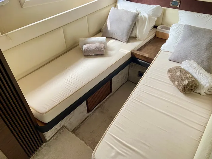  Yacht Photos Pics Luxurious cabin interior of 2012 Azimut 55S yacht with twin beds and plush pillows.