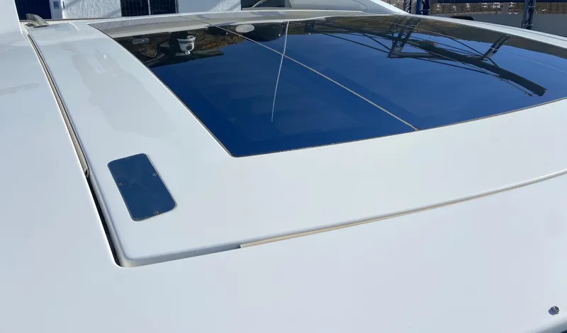  Yacht Photos Pics Azimut 55S 2012 yacht roof with sleek design and reflective glass panel.