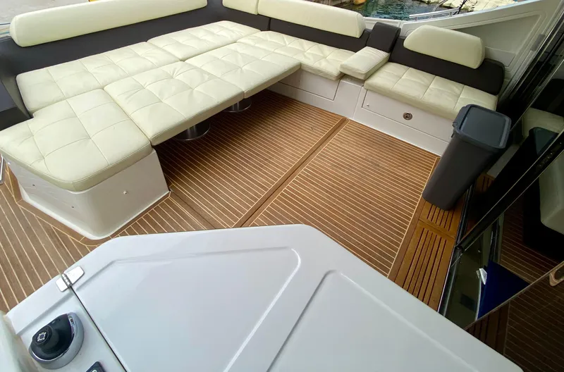  Yacht Photos Pics Luxurious seating area on 2012 Azimut 55S yacht with elegant wood flooring.