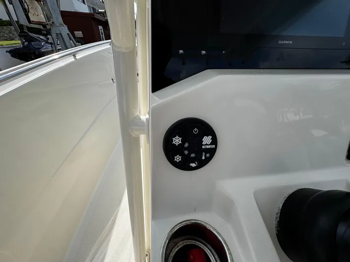  Yacht Photos Pics Control panel on a 2022 Sailfish 290 CC boat dashboard with various buttons.
