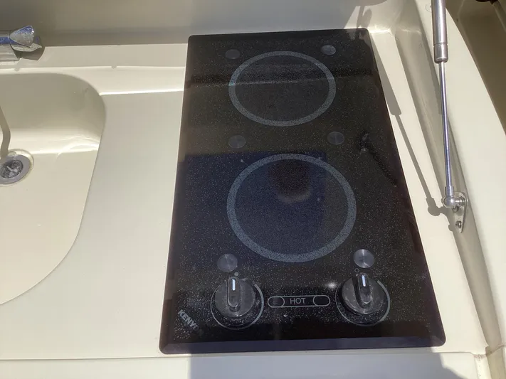  Yacht Photos Pics 2016 Chris-Craft 34 Catalina boat kitchen with electric stovetop.