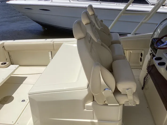  Yacht Photos Pics 2016 Chris-Craft 34 Catalina boat interior with cushioned seating.