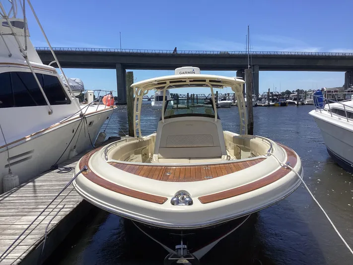  Yacht Photos Pics 2016 Chris-Craft 34 Catalina docked at a marina, front view.
