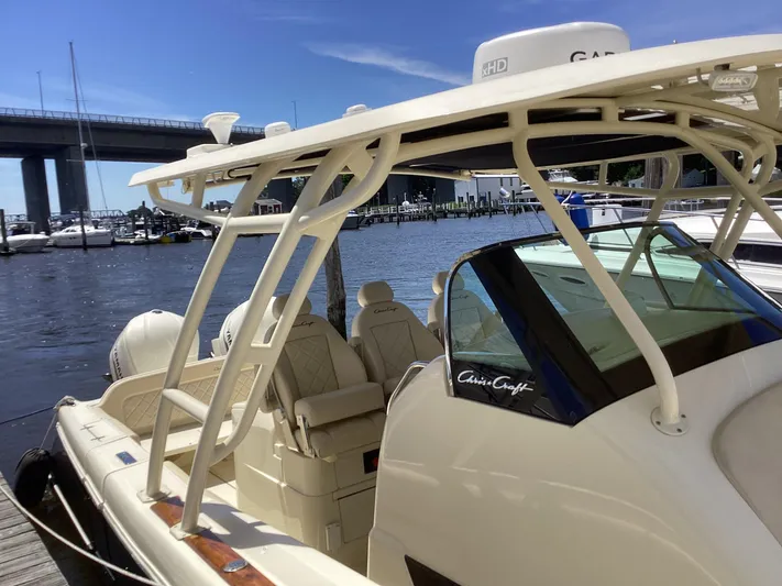  Yacht Photos Pics 2016 Chris-Craft 34 Catalina docked at a marina with bridge in background.