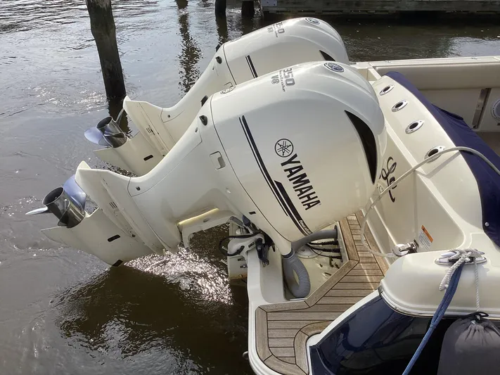  Yacht Photos Pics 2016 Chris-Craft 34 Catalina with twin Yamaha outboard engines docked on water.