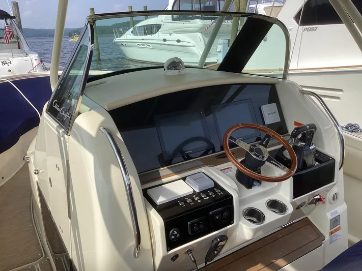  Yacht Photos Pics 2016 Chris-Craft 34 Catalina helm with modern controls and steering wheel.